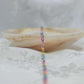 Marissa sterling silver enamel chain with pastel colors on elegant background