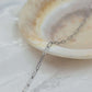 Austin chain featured on a smooth plate, showcasing medium paperclip-style links in 304 PVD Stainless Steel.